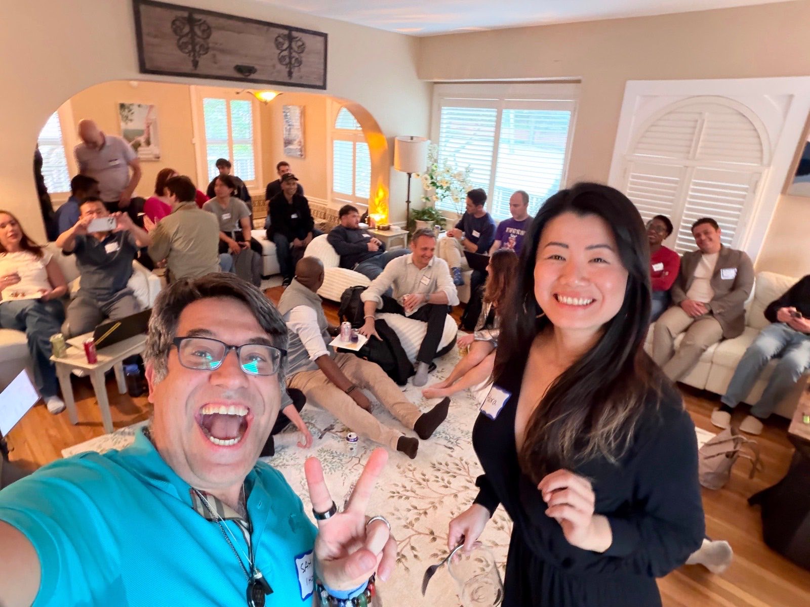 A packed living room in the Lovie house during a demo night in San Francisco